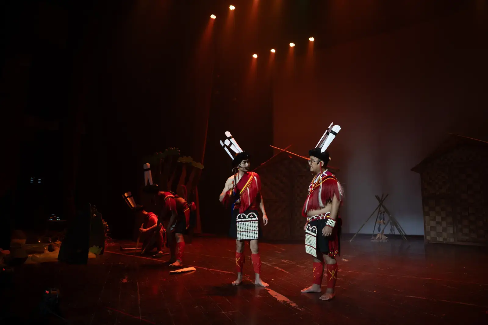 Folk dance reprise — ensemble in red Sümi shawls, A Winter Night's Dream.