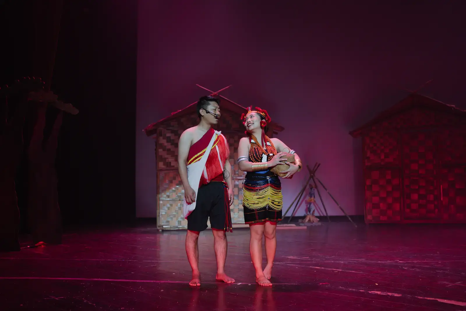 Choreographed dance circle with Sümi folk motifs in red and gold, A Winter Night's Dream.